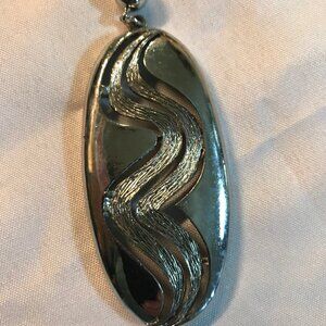 Vintage LISNER very large pendant silver tone